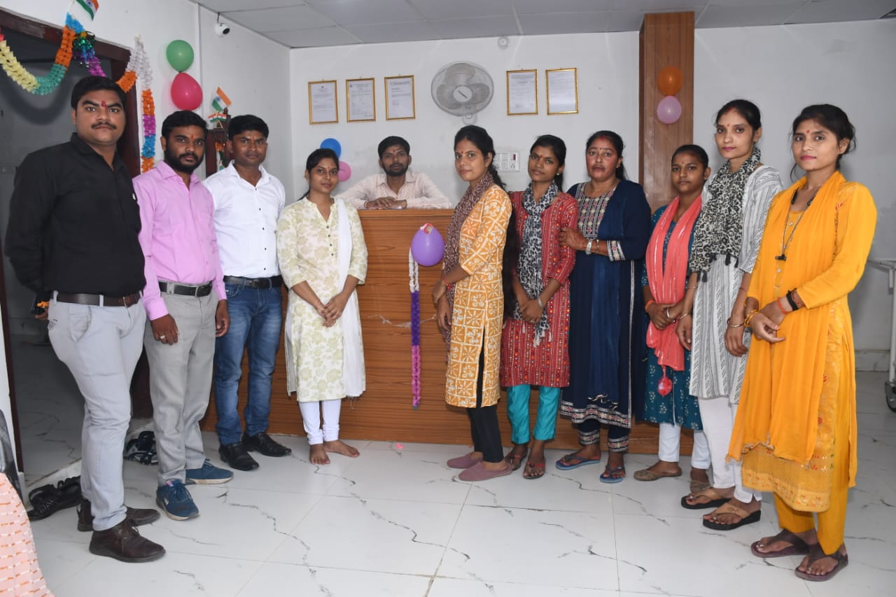 Dr. Bangali consulting a patient